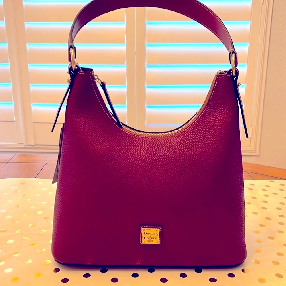 Dooney and Burke satchel bag in Oxblood color